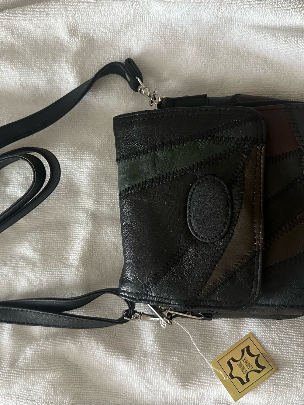 Patchwork Black Leather Crossbody Bag with Green and Brown Accents
